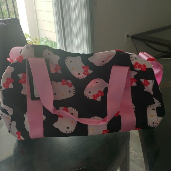 hello kitty duffle bag converse